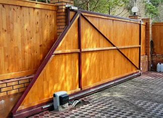 Откатные ворота: особенности установки